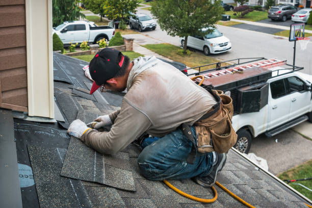 Professional Roofing technician working in Akron, CO